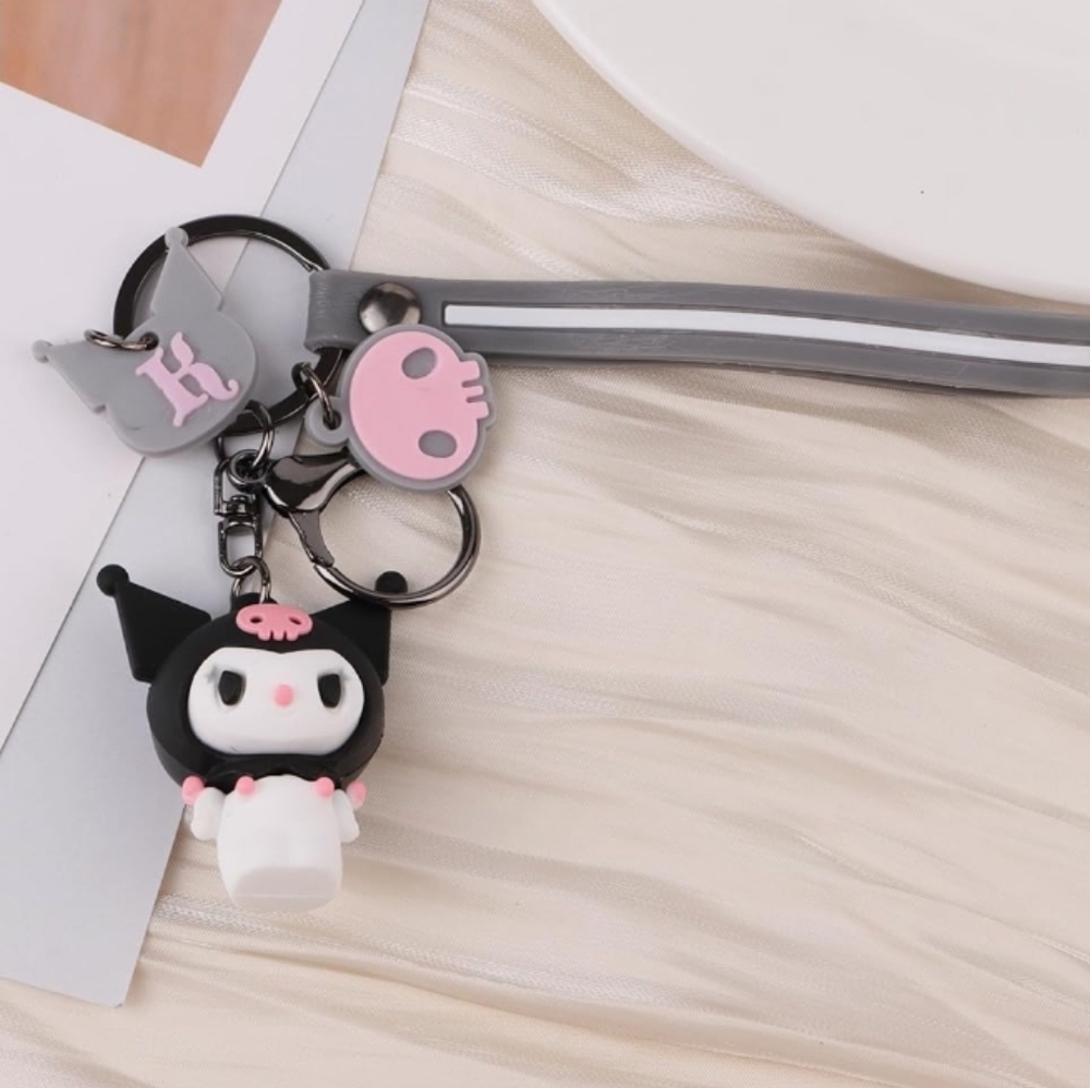 Cute Character Keychain with Pink and Gray Accents